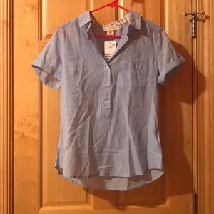 Blue short sleeved button down with floral details